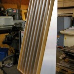 The Acoustic Ramp™ V1.0 front view on the bench at Redco's machine shop